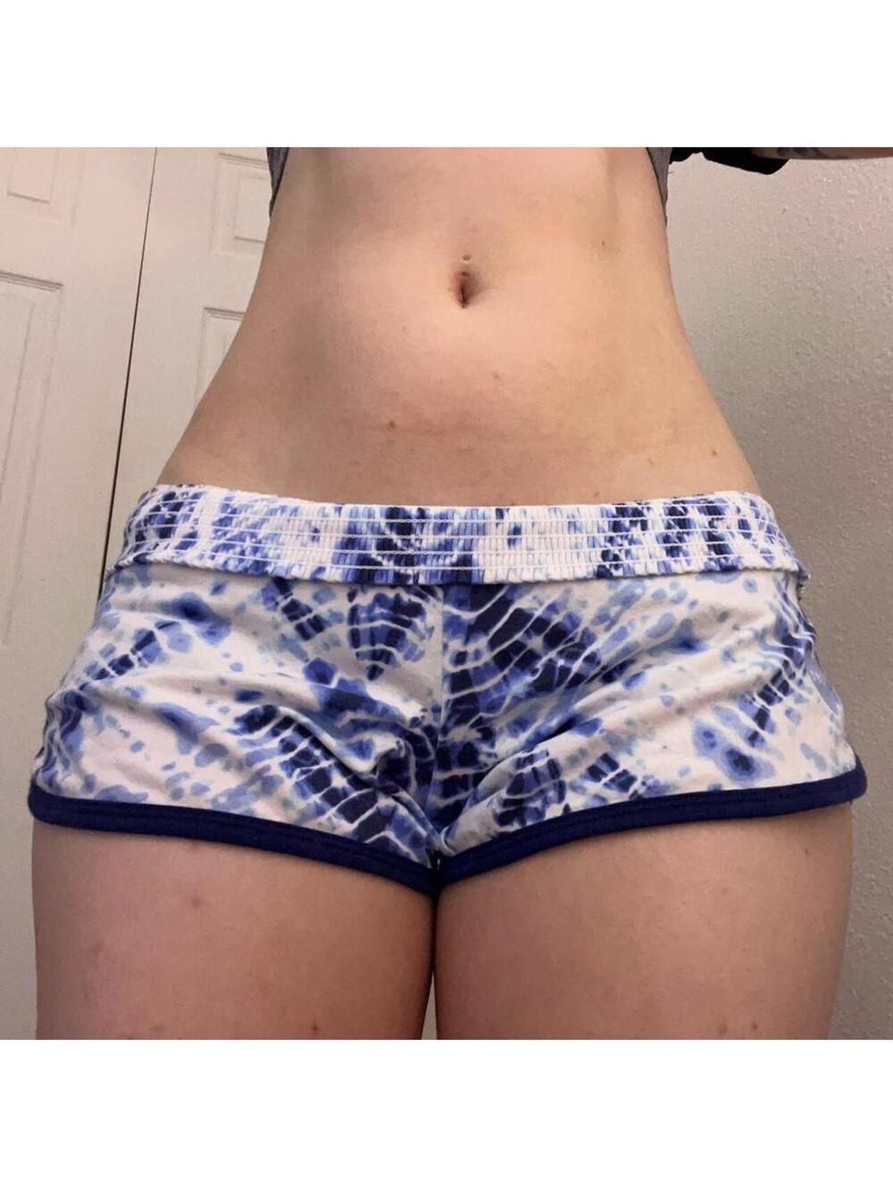 low rise mini shorts with “angel” graphic